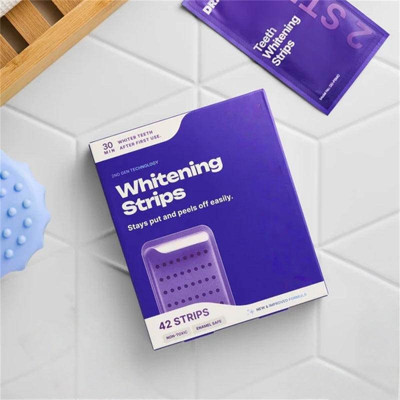 Teeth whitening strip application demonstration
