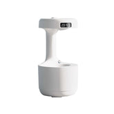 FloatMist humidifier in black on nightstand