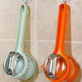 2-in-1 peeler in use peeling fruit
